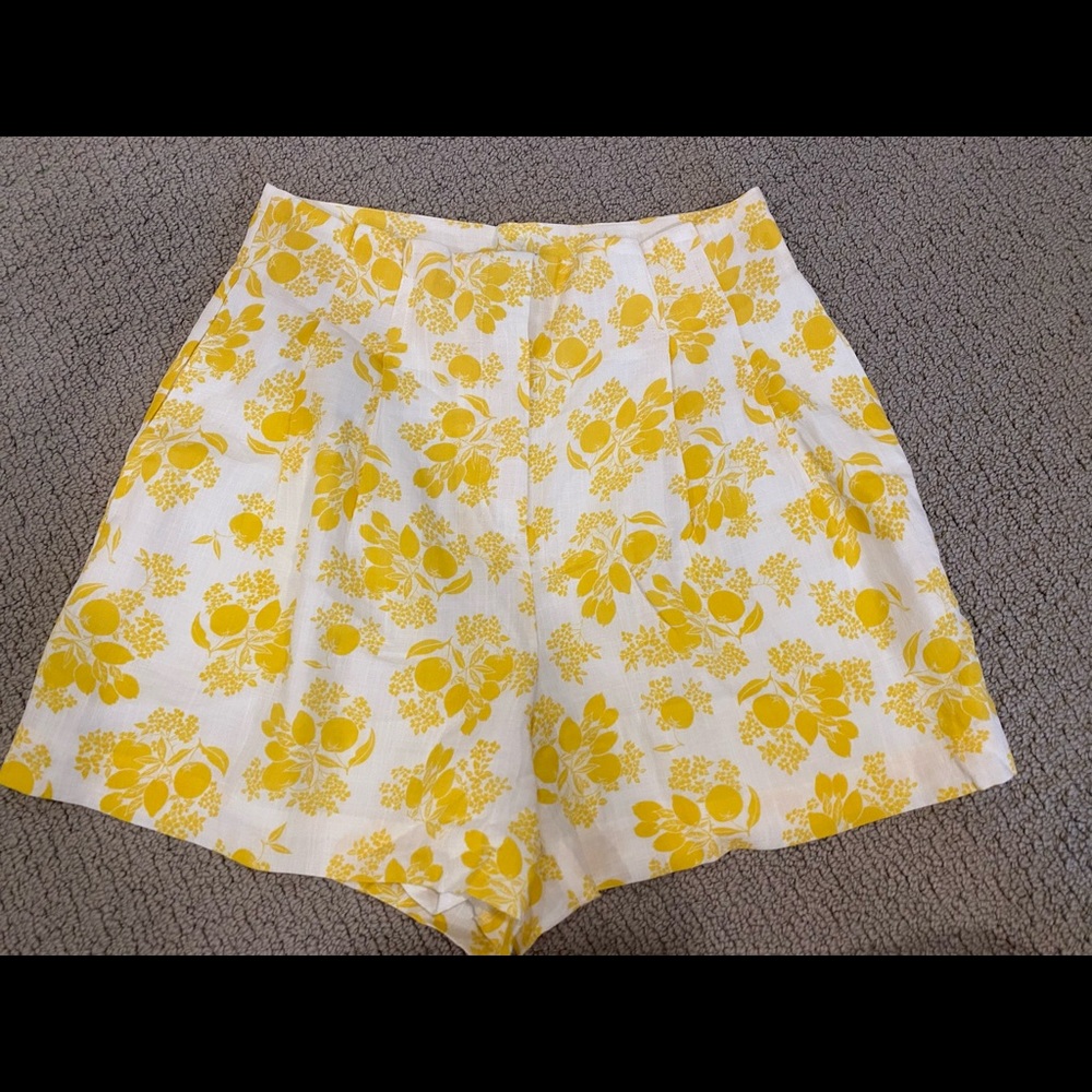 High-waisted paper bag shorts.